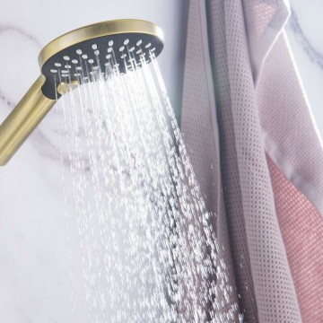 Geborsteld gouden handdouche