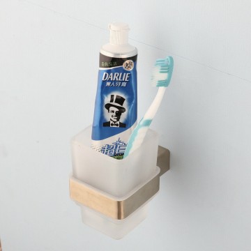 Geborsteld gouden tandenborstel houder