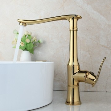 Goud glanzende kraan