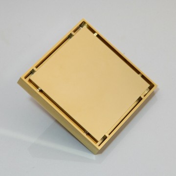 Goudkleurige douche afvoer