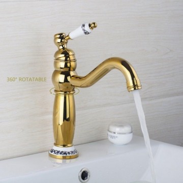 Goudkleurige wastafelkraan 1