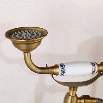 Handdouche bronskleurige badrand badkraan