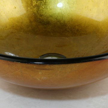 Mooie glazen waskom goud