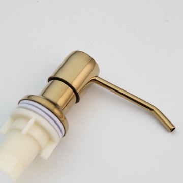 Mooie goudkleurige inbouw zeepdispenser