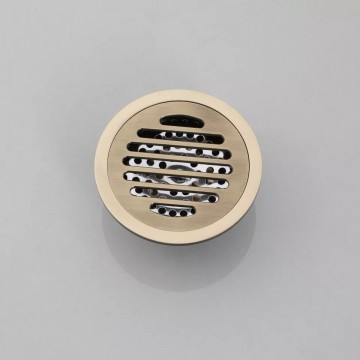 Mooie ronde bronskleurige doucheput