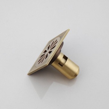 Nostalgisch bronskleurig doucheputje met sifon