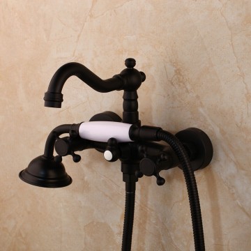 Nostalgische zwarte muurkraan met handdouche met wit handvat