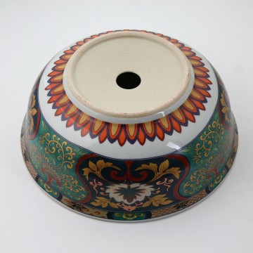 Onderzijde keramiek waskom