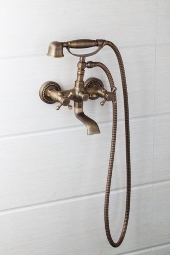 Klassieke bronzen badkraan muurbevestiging inclusief handdouche.