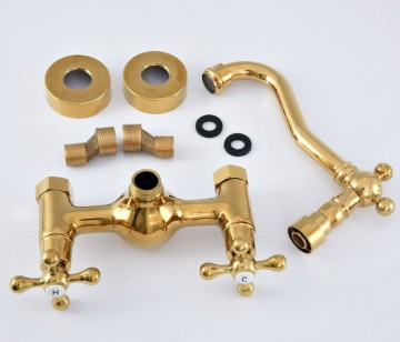 Set gouden muurkraan